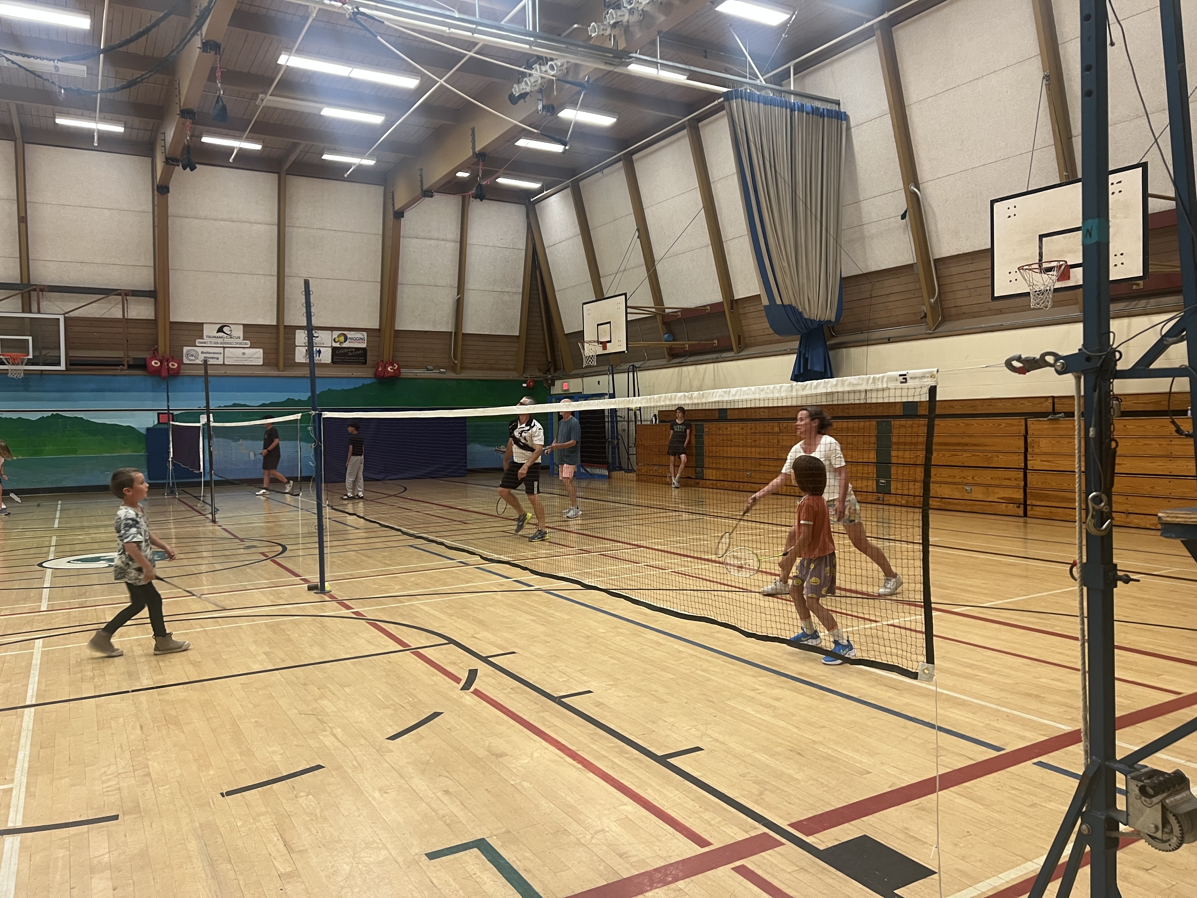 Young players enjoying badminton on Salt Spring Island